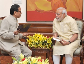 The Governor of Arunachal Pradesh Shri JP Rajkhowa with Prime Minister Shri Narendra Modi at New Delhi on 13th June 2015.